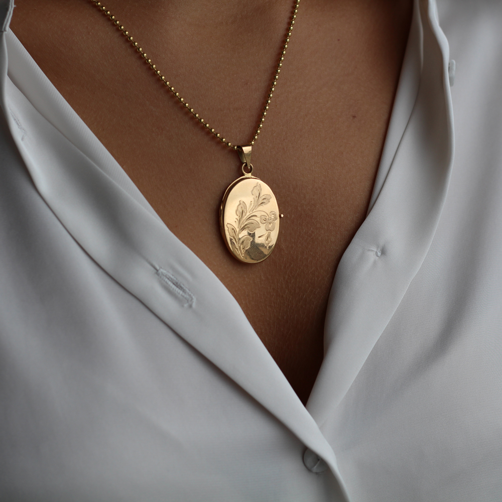 Guldmedaljong 18k oval