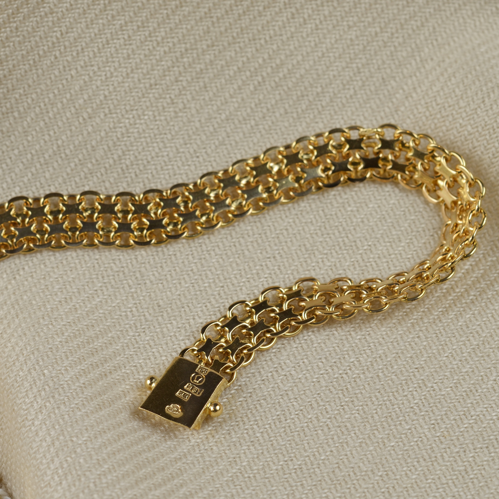 Armband 18k guld x-länk