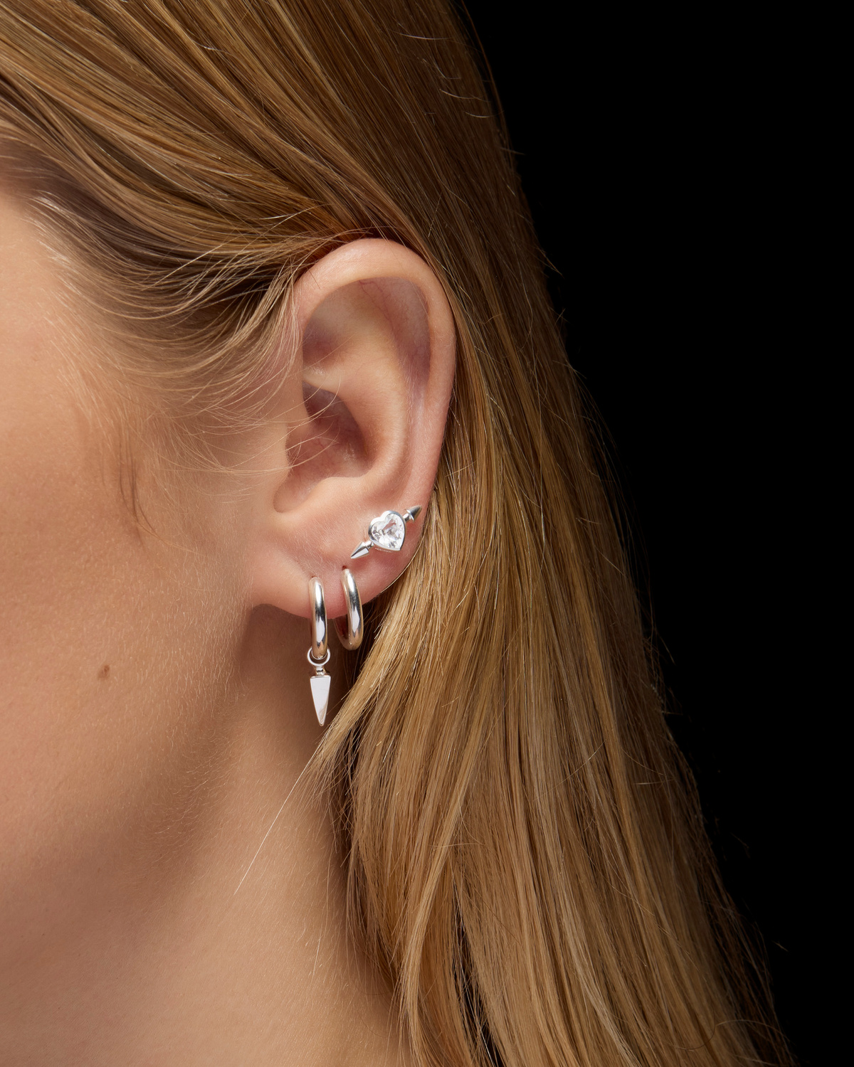 270_d15c27329a-tiny-poison-pierced-heart-ear-stud-silver-clear-quartz-model-0x1500